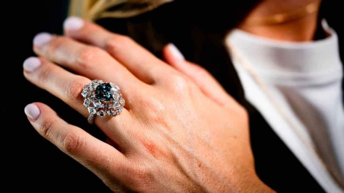 Blue-green diamond sets record, selling for over $17 million