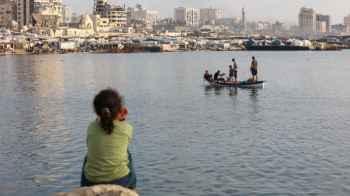 The Eid passed by here... and the Gaza shore is drowning in the silence of sorrows