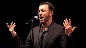 "A calm smile... Kazem Al Saher makes his first appearance after the "death rumor