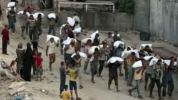 Empty stomachs and weary faces... Gaza screams in silence