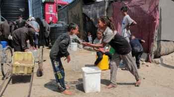 In Front of the Tents.. A Harsh Childhood Writes the Chapters of Resilience