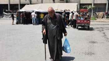 Steps Laden with Pain Toward a Tent Bearing Witness to the Groans of Sorrow