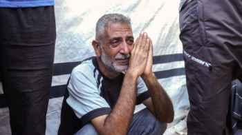 Cry of Pain… A Gazan on the Ruins of His Departed Family