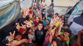 Children’s laughter restores the spirit of a proud homeland after two years of pain