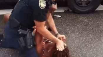 Police Officer Violently Assaults African-American Woman