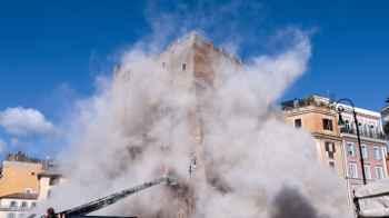 Historic tower collapses in Rome, injuring one worker and trapping another