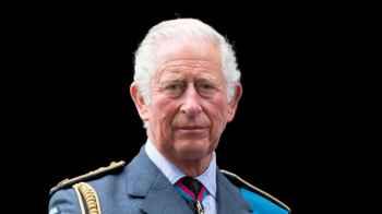 King Charles drives train himself (video)