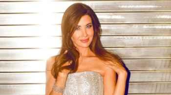 Nancy Ajram Captivates Attention in a Silver Dress