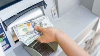 Money stolen from 14 ATMs in UK