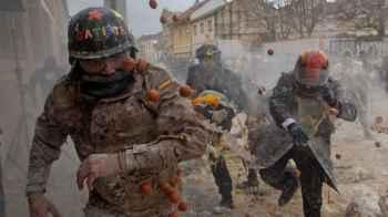 Annual festival engulfs streets with eggs and flour – photos