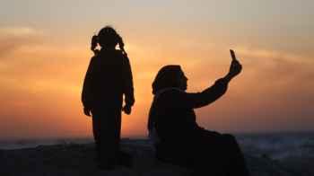 Through the Lens of Nostalgia on the Gaza Beach… When Photos Are Captured from the Pain of Memory