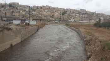 Alarming incident shakes Zarqa… Person falls into flood channel and urgent response mobilized