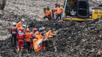 Several Lives Claimed as Landslide Hits Garbage Dump in Indonesia