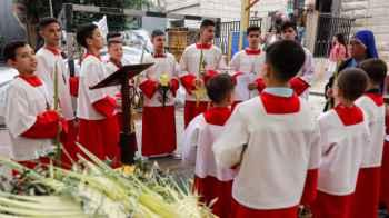 Gaza chants its joy over the ruins of pain on Palm Sunday