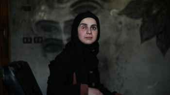 She lost her eye, but not her vision.. Areej Al-Saafeen draws hope from the pride of her homeland
