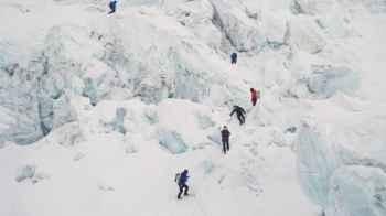 Photos show hundreds of climbers attempting to scale Mount Everest despite the dangers